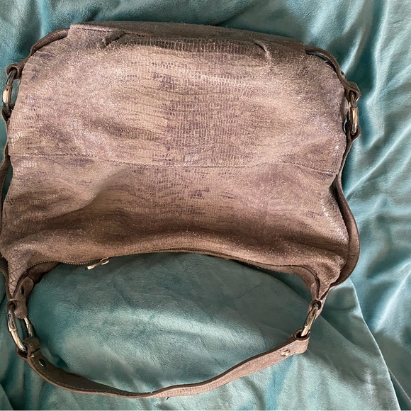 Michael Kors purse very stylish. Beautiful color goes well with everything - Picture 5 of 5